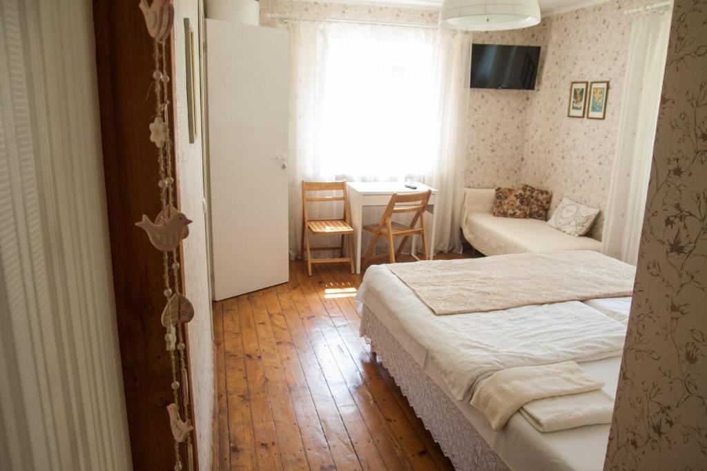 Postel nebo postele na pokoji v ubytování Viesu māja Sprīdīši