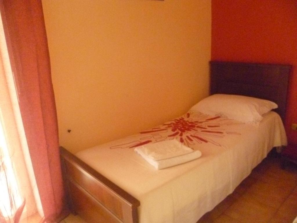 Postel nebo postele na pokoji v ubytování Villa Contino