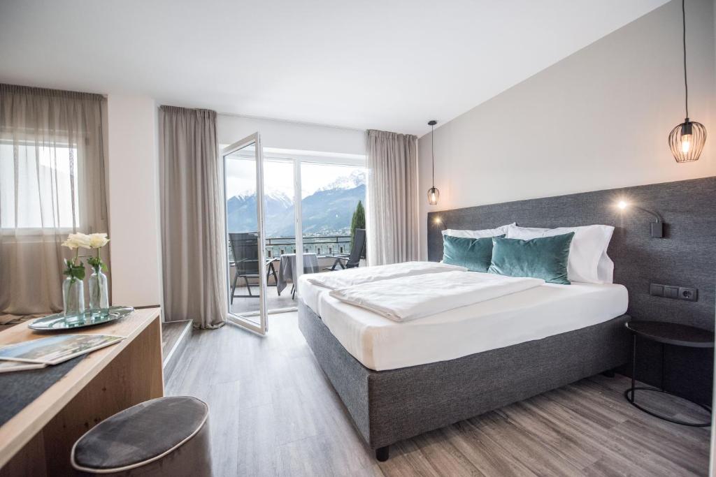 Postel nebo postele na pokoji v ubytování Hotel Walter