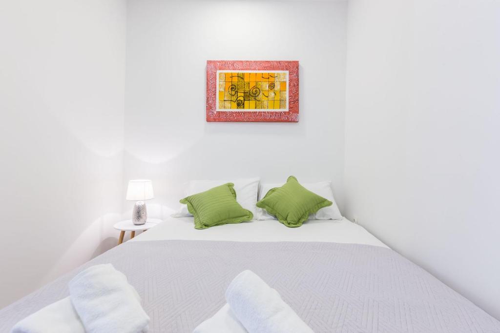 Posteľ alebo postele v izbe v ubytovaní 2sis apartments