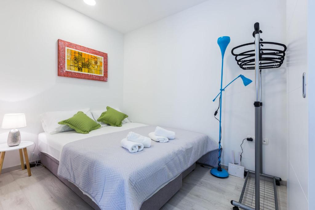 Posteľ alebo postele v izbe v ubytovaní 2sis apartments