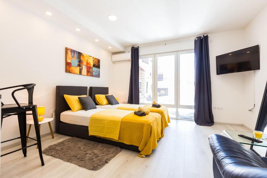 Posteľ alebo postele v izbe v ubytovaní 2sis apartments