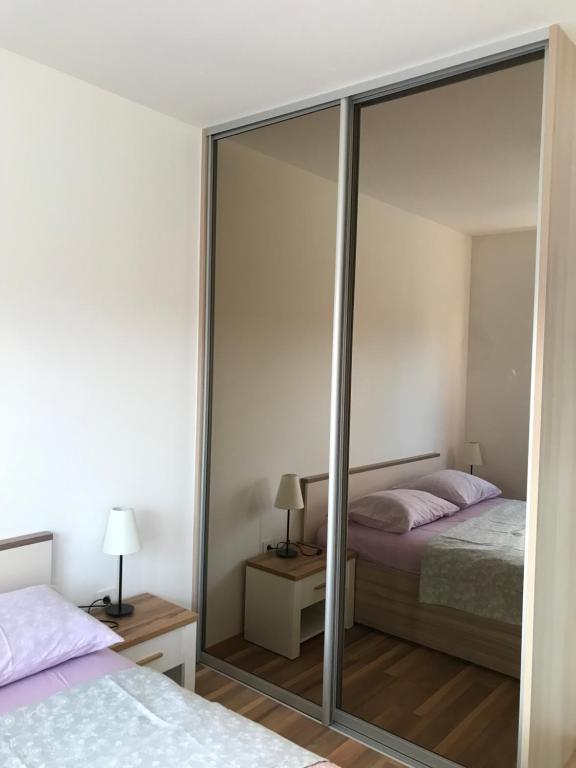 Posteľ alebo postele v izbe v ubytovaní Apartmani Matea