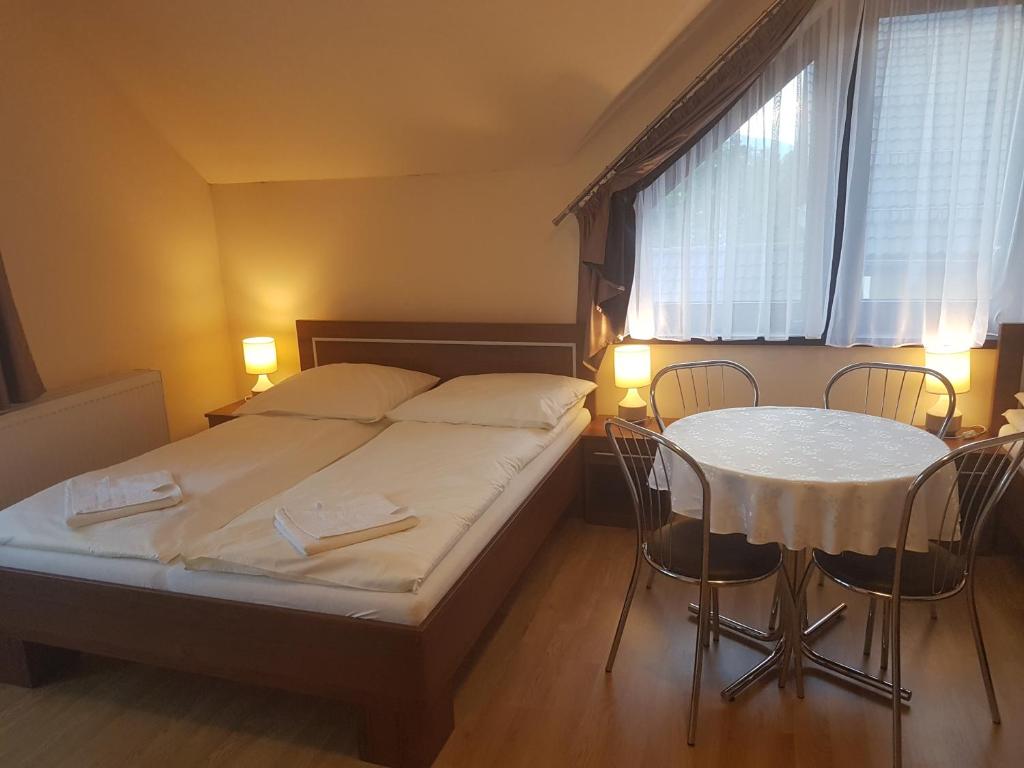 Posteľ alebo postele v izbe v ubytovaní U Andzi