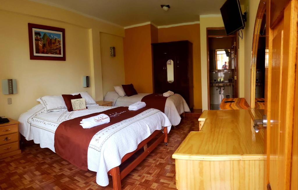 Postel nebo postele na pokoji v ubytování Morales Guest House