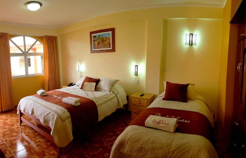 Postel nebo postele na pokoji v ubytování Morales Guest House