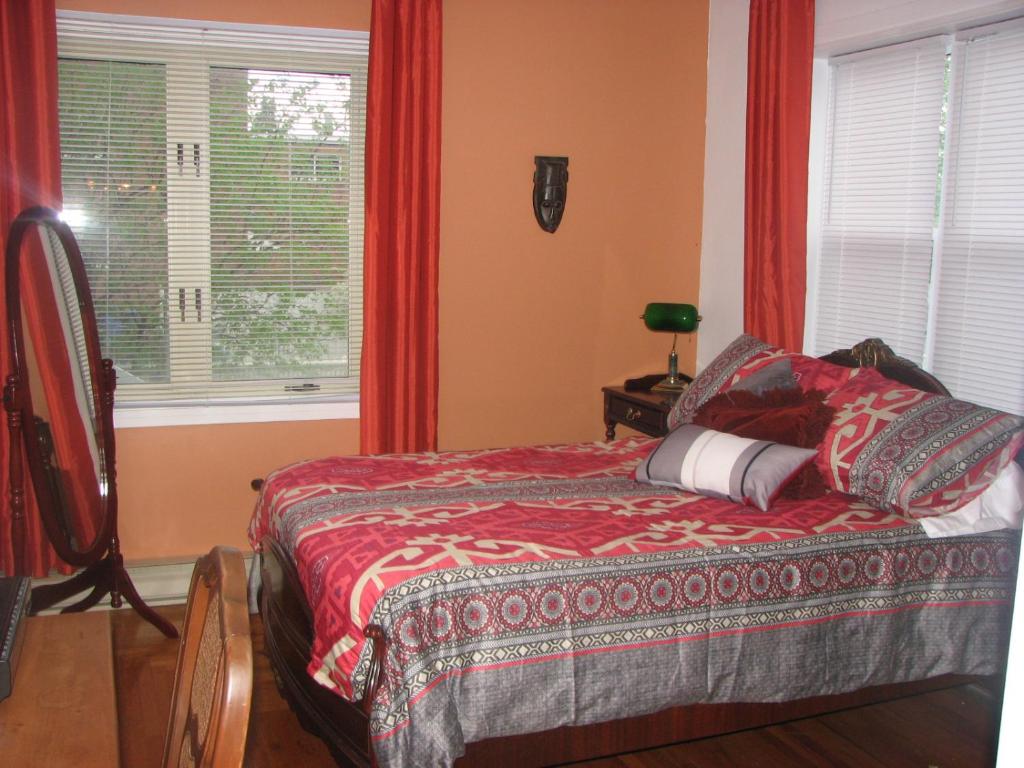 Postel nebo postele na pokoji v ubytování Magnolia B&B