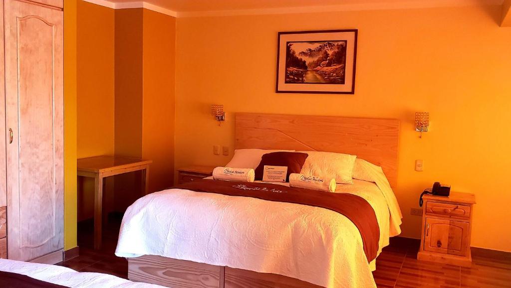 Postel nebo postele na pokoji v ubytování Morales Guest House
