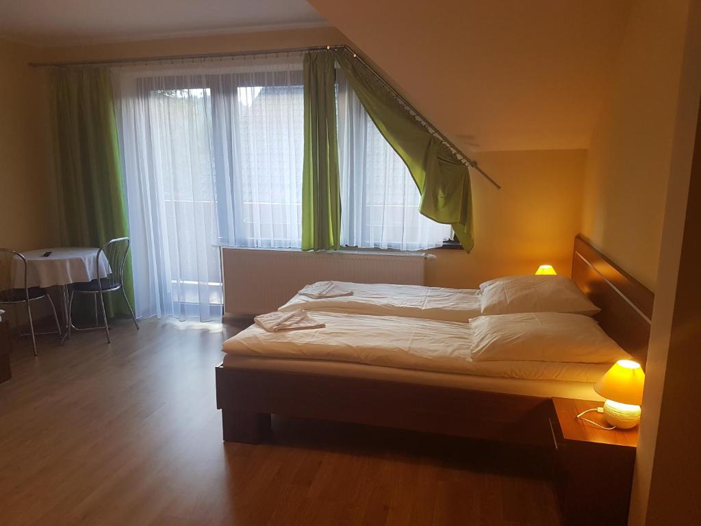 Posteľ alebo postele v izbe v ubytovaní U Andzi