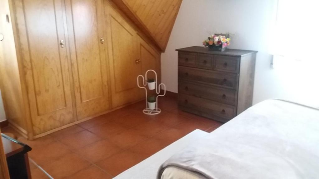 Postel nebo postele na pokoji v ubytování Ático en Pontevedra ciudad