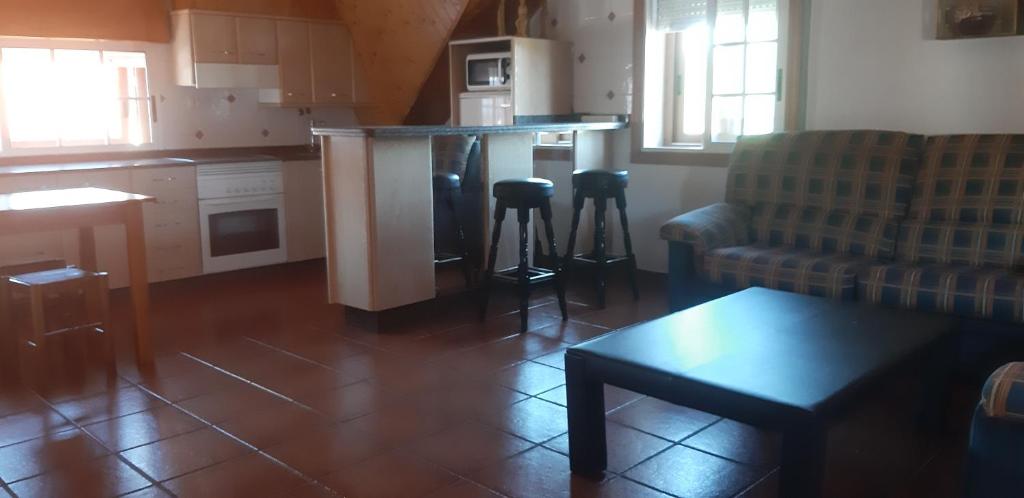 Kuchyň nebo kuchyňský kout v ubytování Ático en Pontevedra ciudad