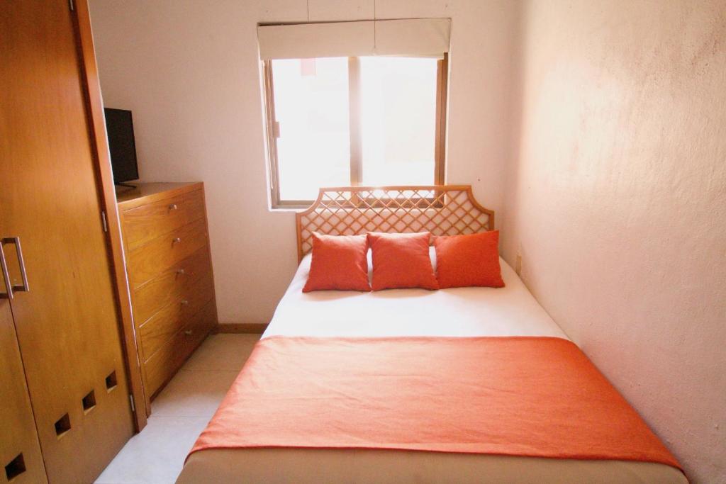 Postel nebo postele na pokoji v ubytování Villas del Sol en Los Tules