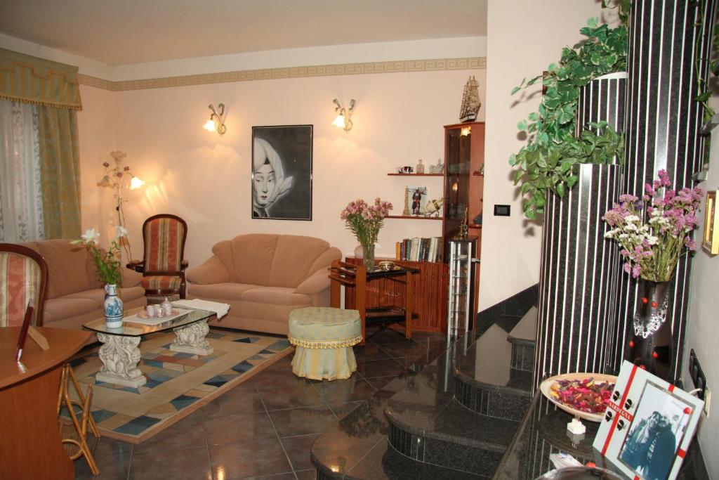 Posezení v ubytování Locazioni Brevi La RosaViola GUEST ROOMS