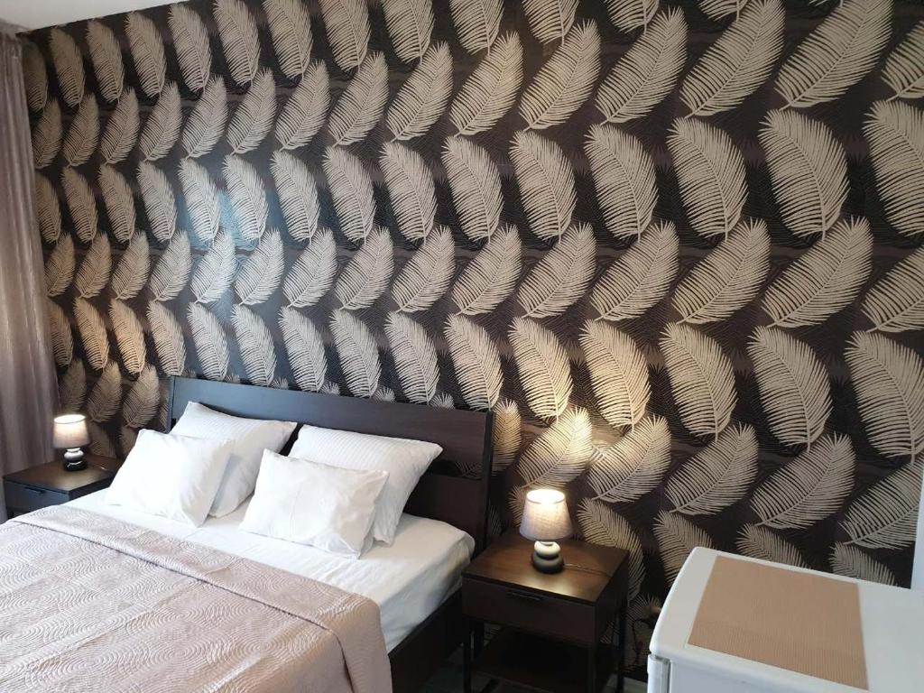 Voodi või voodid majutusasutuse Apartmani i sobe Goca toas