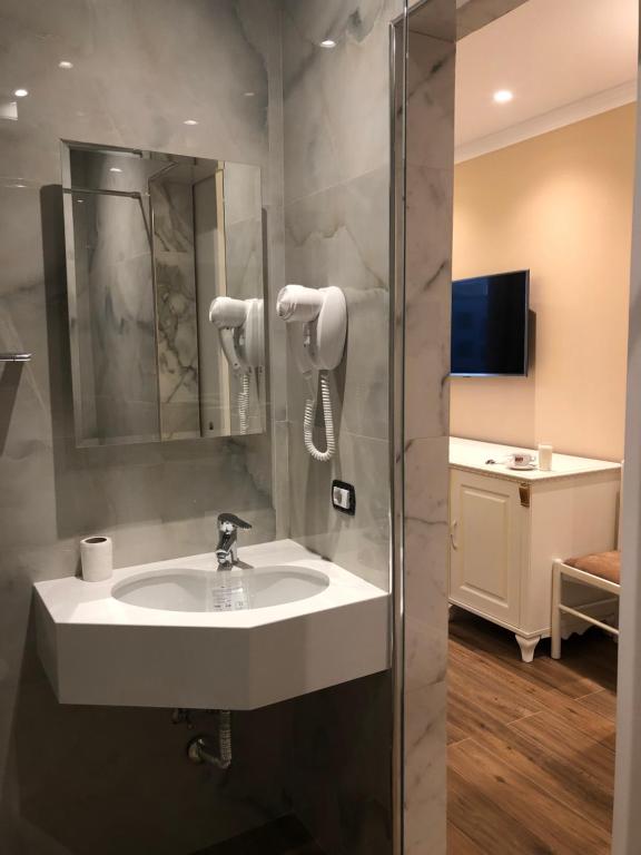 Koupelna v ubytování Hotel Vila Mare