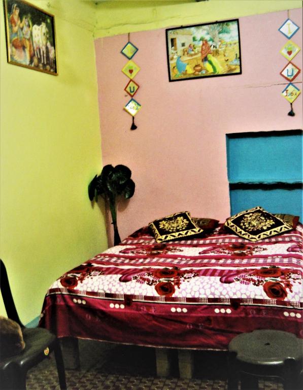 Postel nebo postele na pokoji v ubytování Shiva lodge