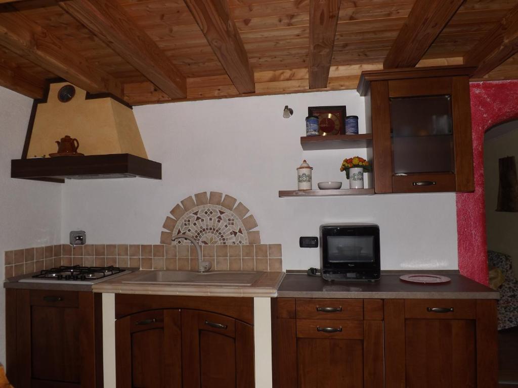 Kuchyňa alebo kuchynka v ubytovaní Chez Lucie CIR 0010