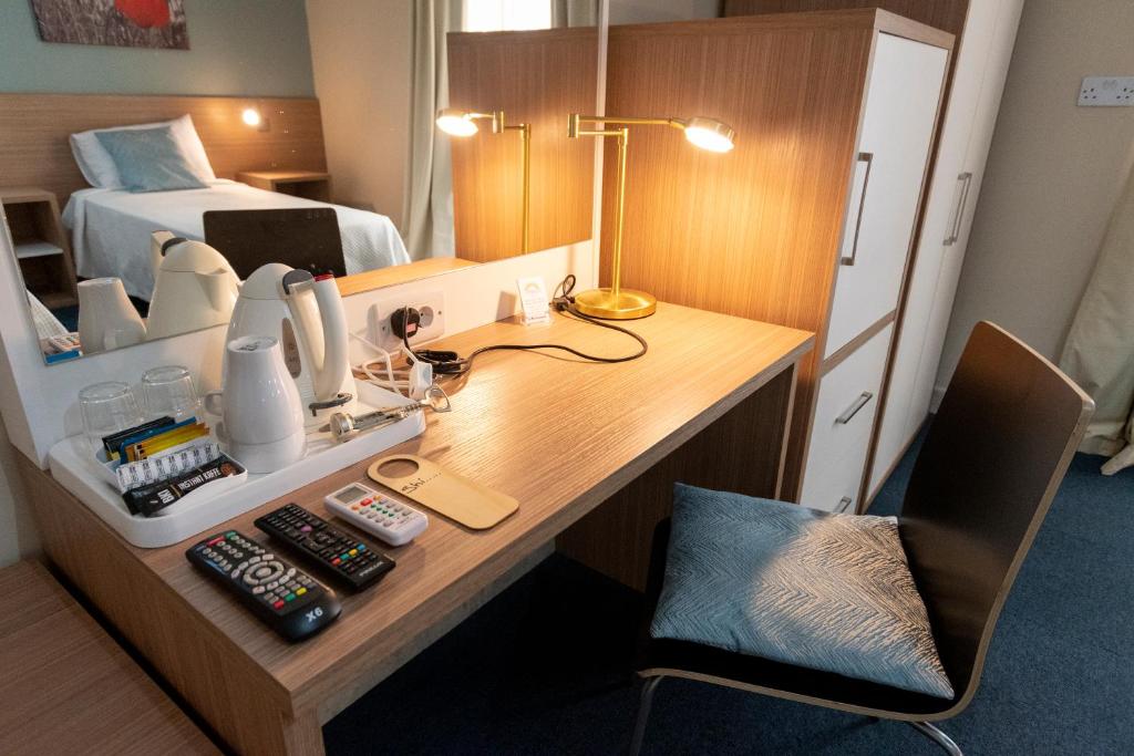Kuchyň nebo kuchyňský kout v ubytování Estrella Lodging