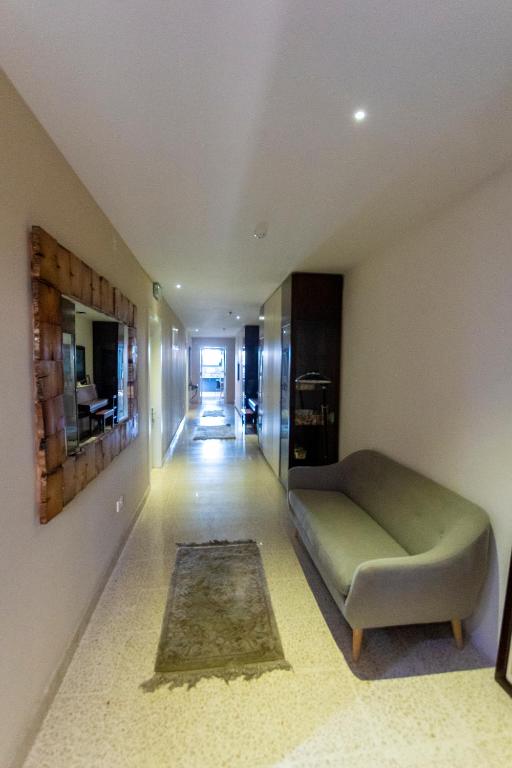 TV a/nebo společenská místnost v ubytování Estrella Lodging