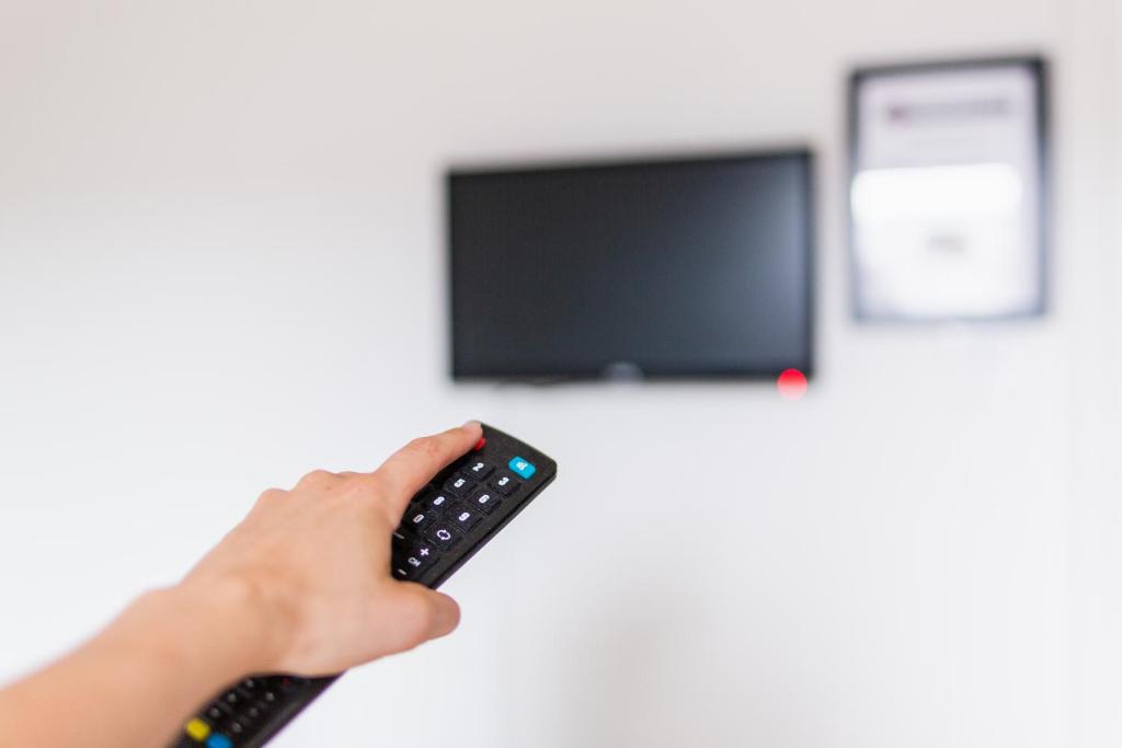 TV a/nebo společenská místnost v ubytování CarlstadCity H Boutique Hotell