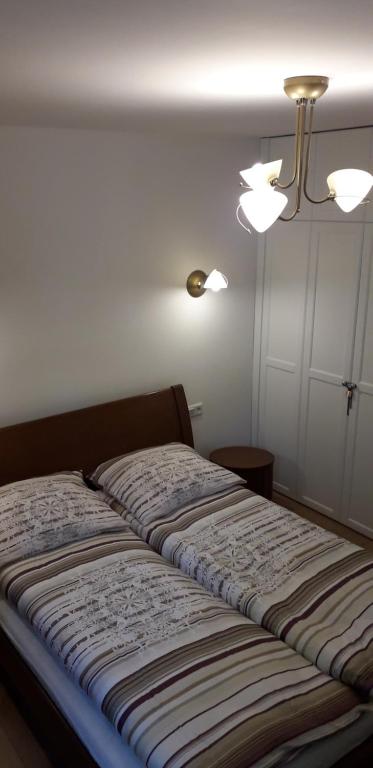 Posteľ alebo postele v izbe v ubytovaní Apartament u Janka