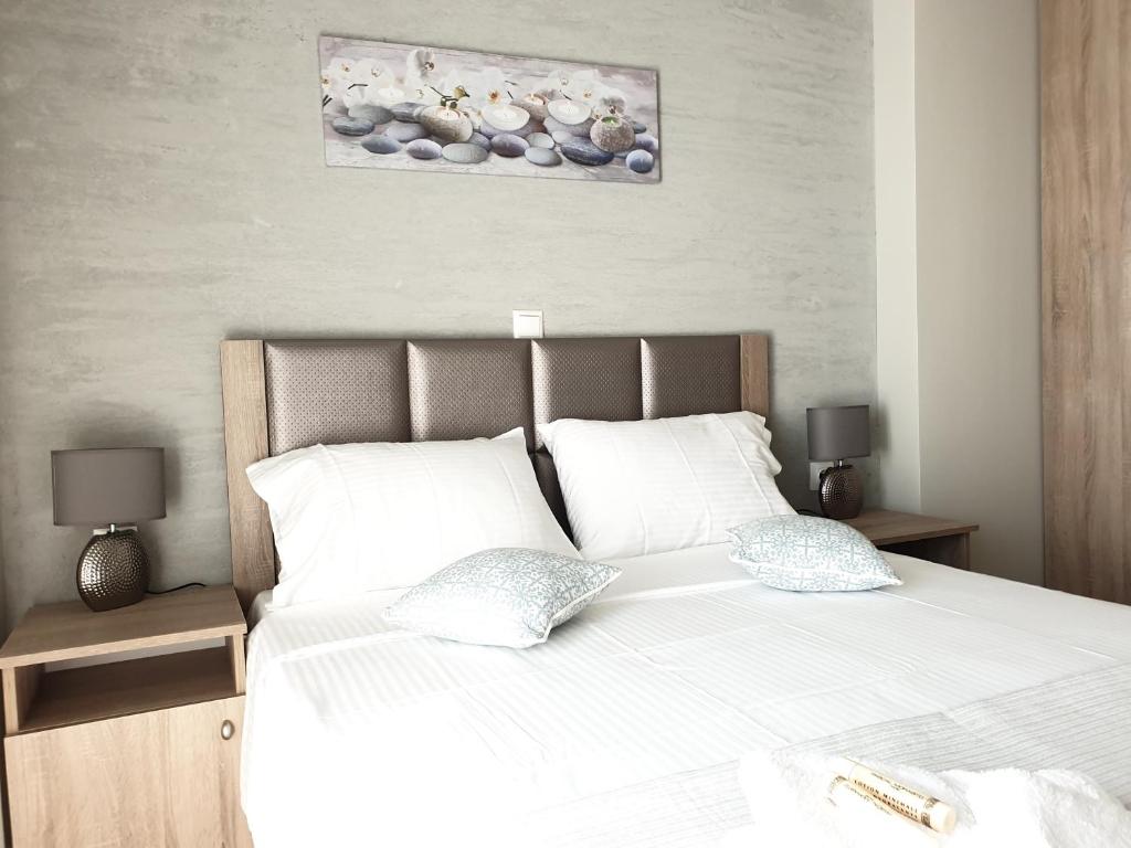 Posteľ alebo postele v izbe v ubytovaní Villas Mamas Beach