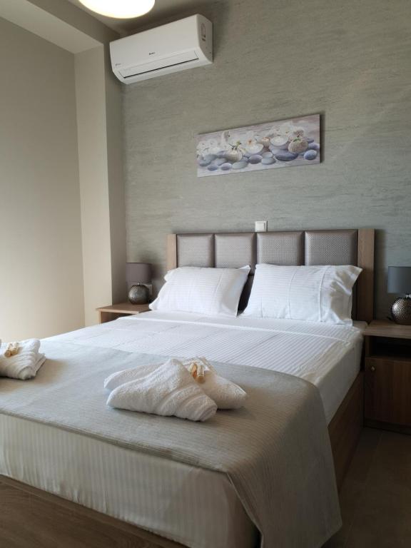 Posteľ alebo postele v izbe v ubytovaní Villas Mamas Beach
