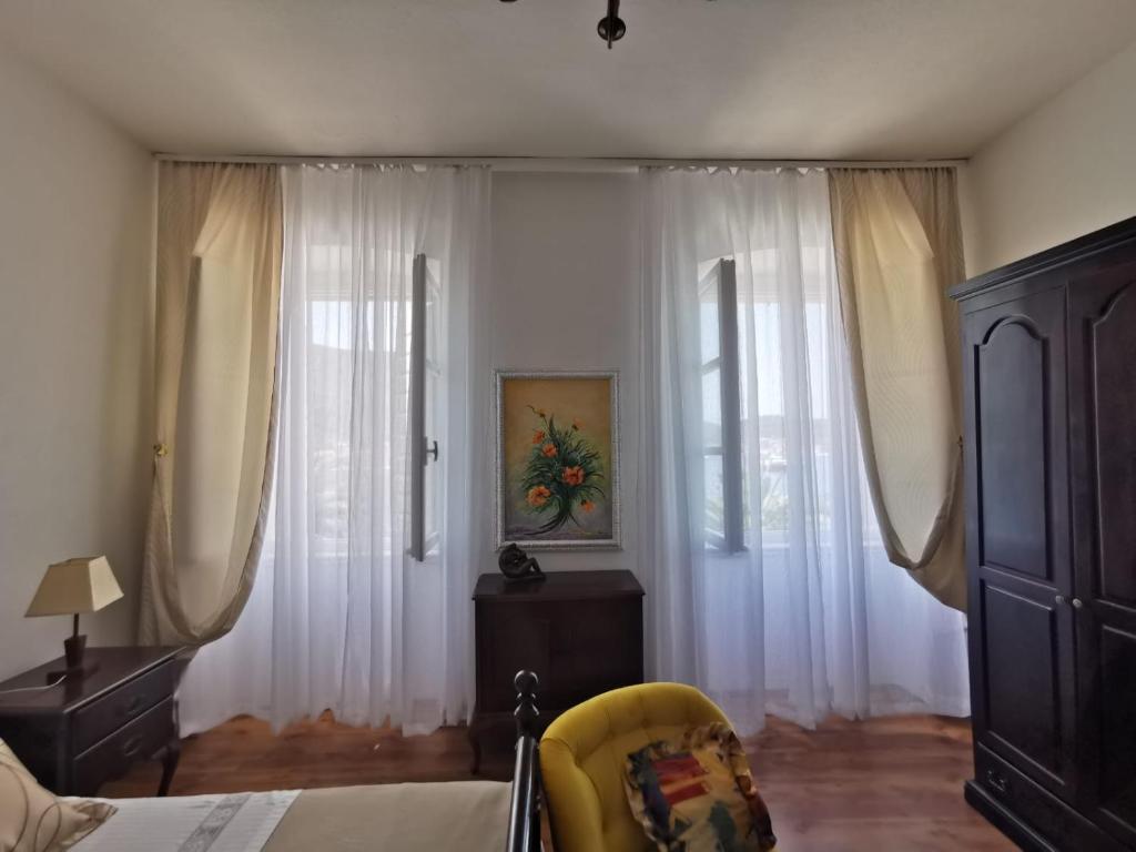 Postel nebo postele na pokoji v ubytování Apartman nono Ive