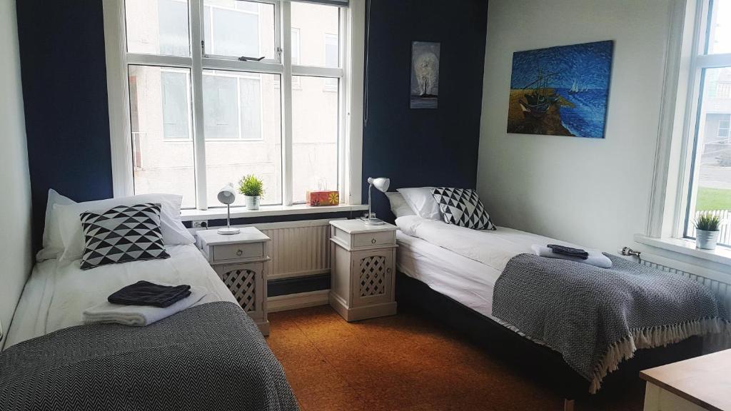 Postel nebo postele na pokoji v ubytování Refurinn Reykjavik Guesthouse