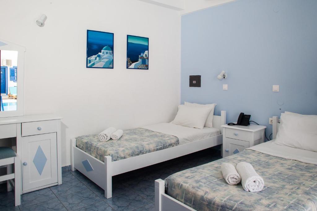 Postel nebo postele na pokoji v ubytování Roula Villa Studios & Apartments