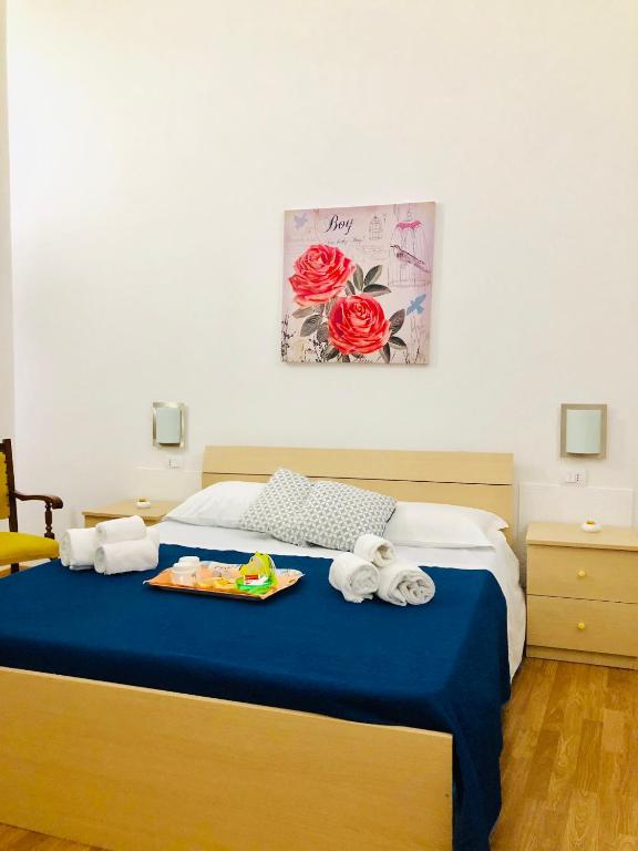 Posteľ alebo postele v izbe v ubytovaní La Casa del Barocco
