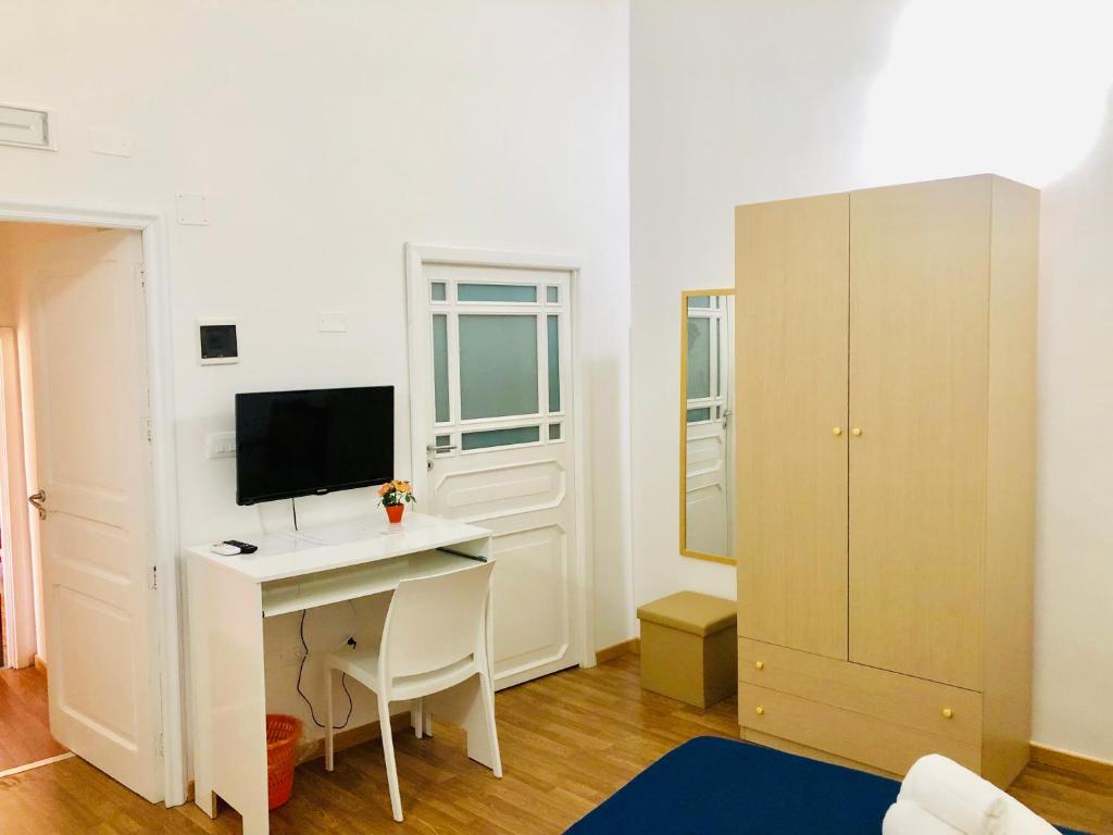 Televízia a/alebo spoločenská miestnosť v ubytovaní La Casa del Barocco