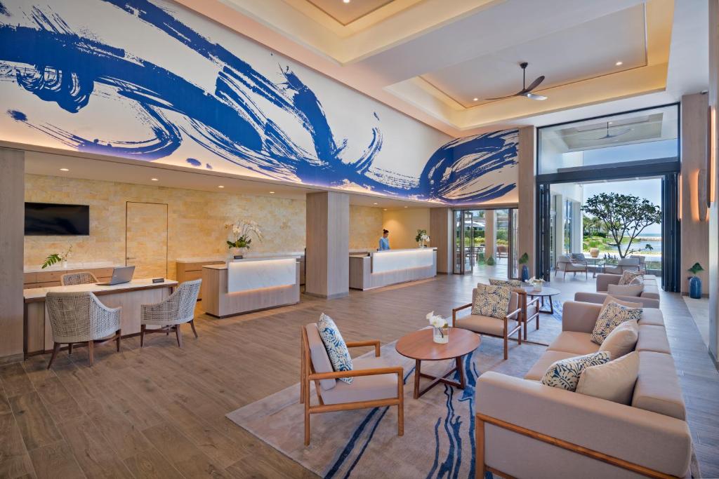 TV a/nebo společenská místnost v ubytování Melia Ho Tram Beach Resort