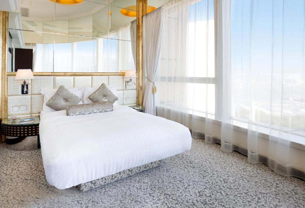 Voodi või voodid majutusasutuse Regal Hongkong Hotel toas