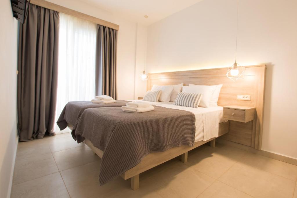 Posteľ alebo postele v izbe v ubytovaní Porfyris Studios and Apartments