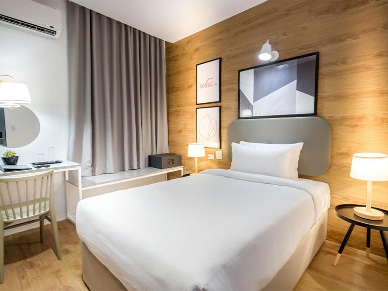 Postel nebo postele na pokoji v ubytování Avior Hotel