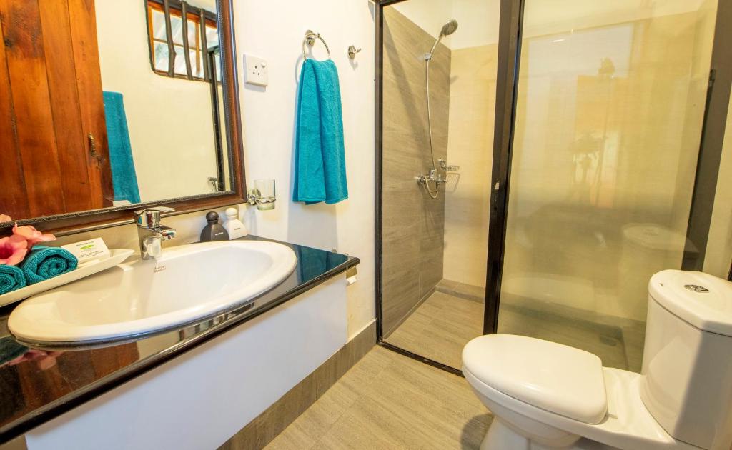 Koupelna v ubytování Muwan Palassa Resort