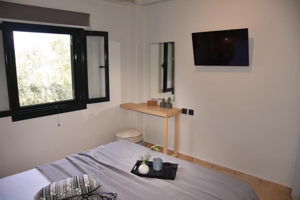 Postel nebo postele na pokoji v ubytování Olivella Villas by Vatos