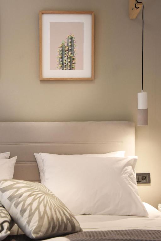 Postel nebo postele na pokoji v ubytování Olivella Villas by Vatos