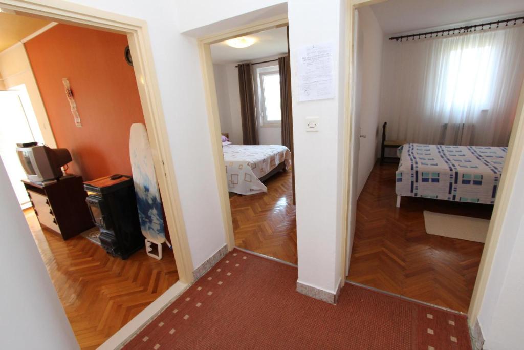 Łóżko lub łóżka w pokoju w obiekcie Apartment Rokov