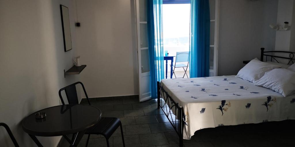 Postel nebo postele na pokoji v ubytování Ammonitis