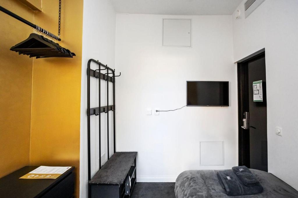 TV a/nebo společenská místnost v ubytování Eight Rooms