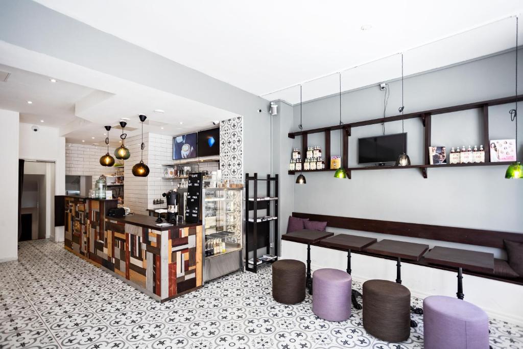 TV a/nebo společenská místnost v ubytování Eight Rooms
