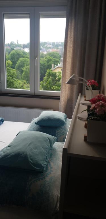 Posteľ alebo postele v izbe v ubytovaní Blue Ball Apartment