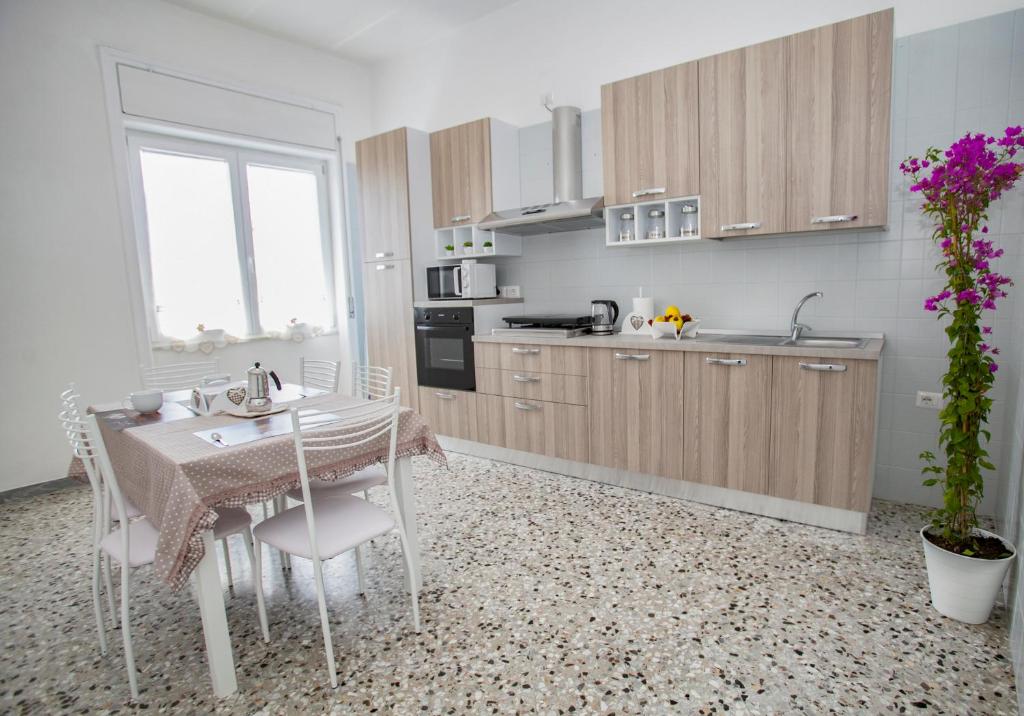 Kuchyň nebo kuchyňský kout v ubytování Boscoreale Vanilla Flats Free Parking