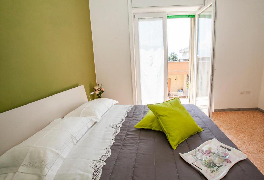 Postel nebo postele na pokoji v ubytování Boscoreale Vanilla Flats Free Parking