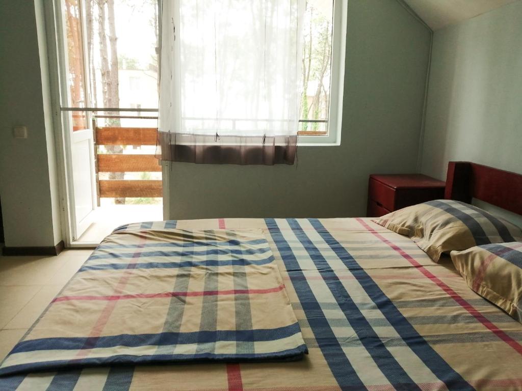Postel nebo postele na pokoji v ubytování Villa Vachnadze