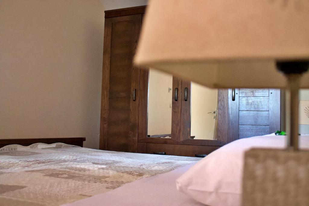 Posteľ alebo postele v izbe v ubytovaní Apartment Kaktus