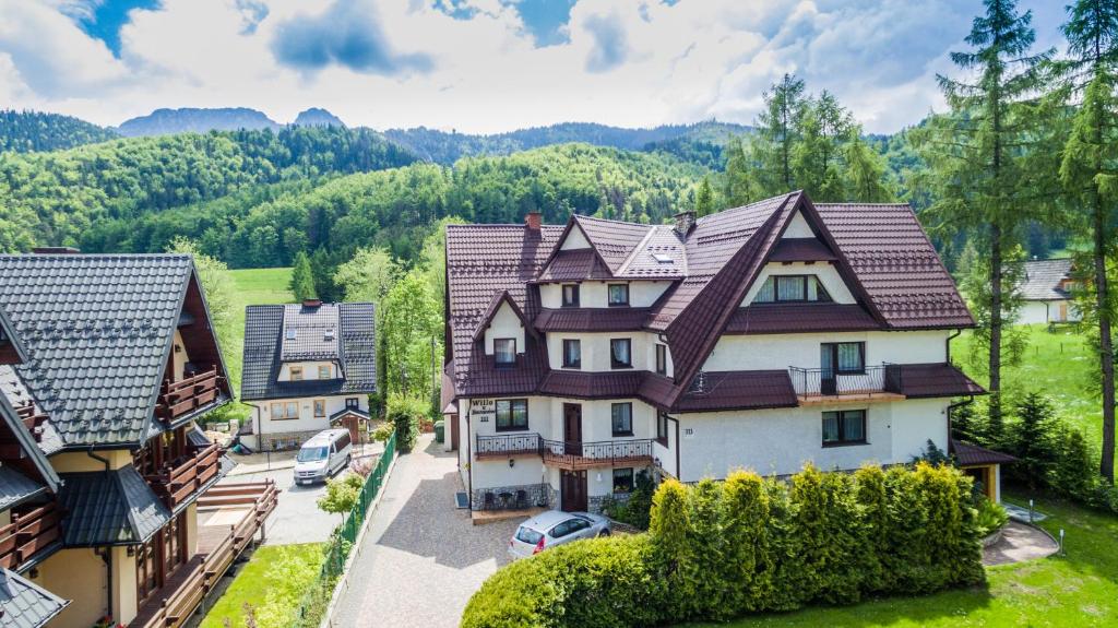 an aerial view of a village with houses at Willa u Baranów in Zakopane