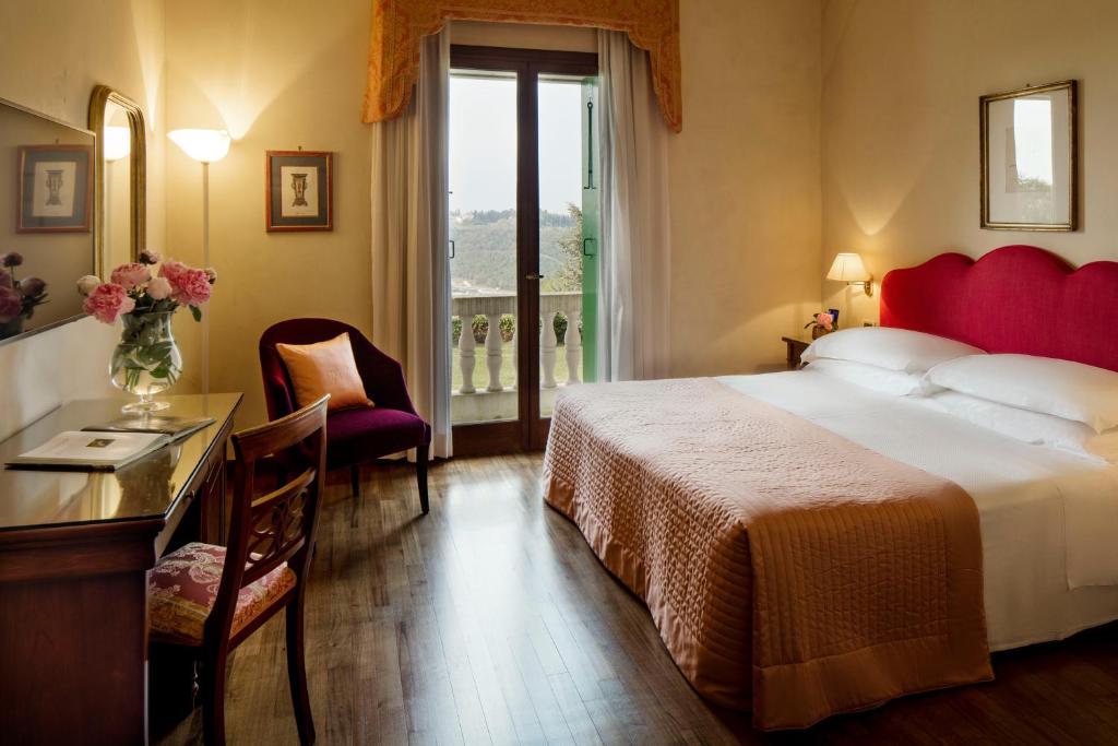 Postel nebo postele na pokoji v ubytování Villa Michelangelo Vicenza – Starhotels Collezione